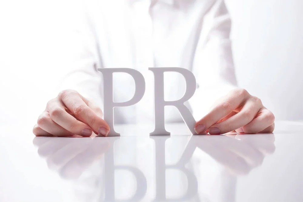 PR